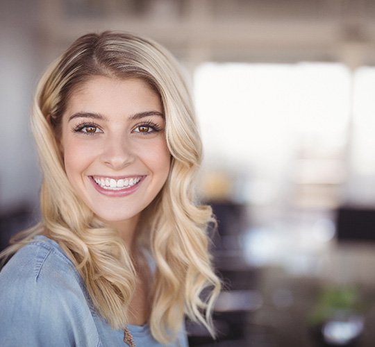 closeup of young woman smiling 